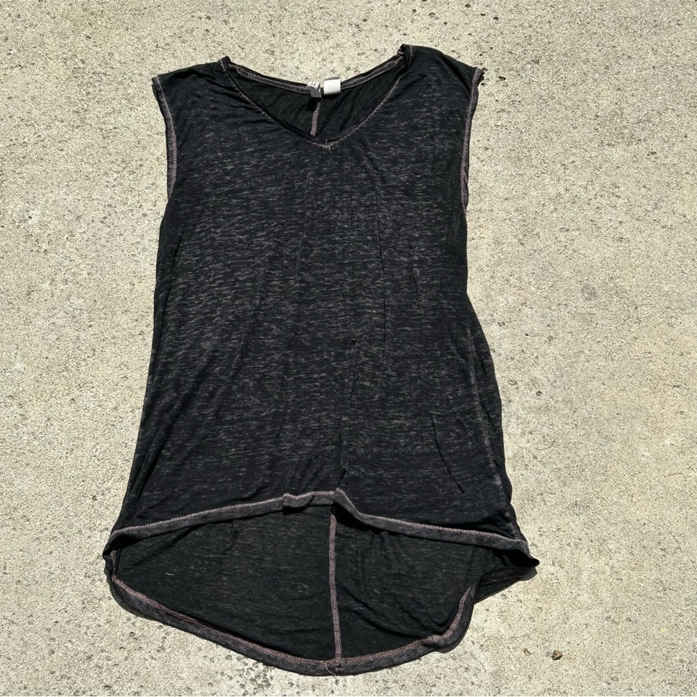 Divided black mesh muscle top